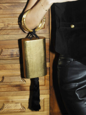 FAVOR-GOLD-MENOTTES-TASSEL-ON-MODEL.jpg
