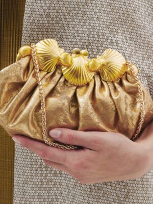 SHELL-CROWN-ON-GOLD-POUFFY-ON-MODEL.jpg